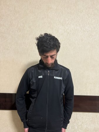 Bayrağa hörmətsizlik edən şəxs saxlanıldı - Foto